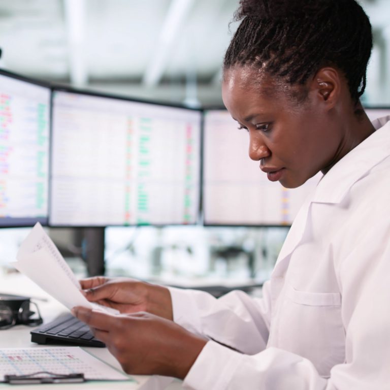 African American Hospital Administrator Embraces Healthcare Technology For Efficiency Improvements.